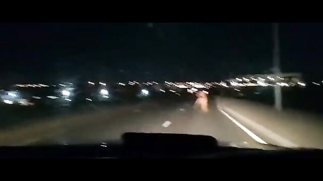 Another Naked Mad African Woman With Big Ass Caught In Public In South Africa, Obstructing Night Traffic - 1 image