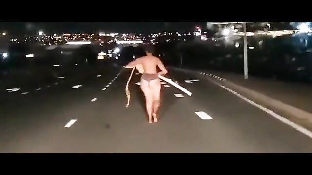 Another Naked Mad African Woman With Big Ass Caught In Public In South Africa, Obstructing Night Traffic - 4 image