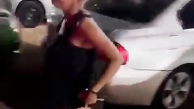 Drunk woman showing pussy and ass in public outside a South African club