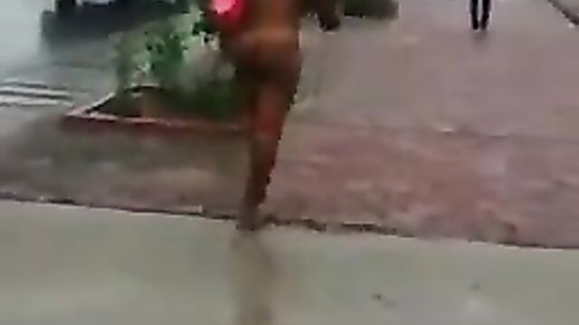 Mad African Woman With Big Breasts Caught Naked In Public Carrying Handbag (Full Video 18+) - 1 image