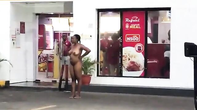 Naked Mad Woman Filmed Standing In Front Of Chicken Republic At Ilupeju, Lagos - 3 image