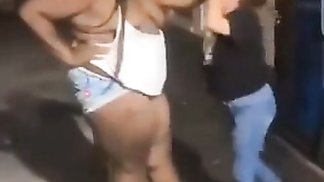 Boobs Out As Giant Girlfriend Beats Up Boyfriend’s Small Side Chick In Public - 5 image