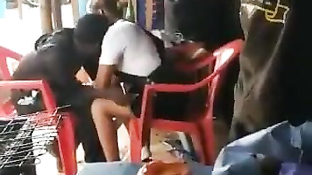 Lady masturbating her boyfriend in a public restaurant in front of a crowd! - 4 image