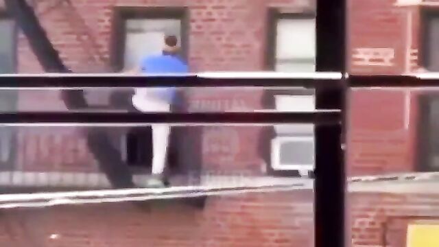 Side chick gets pushed and falls off storey building after getting caught cheating! - 1 image