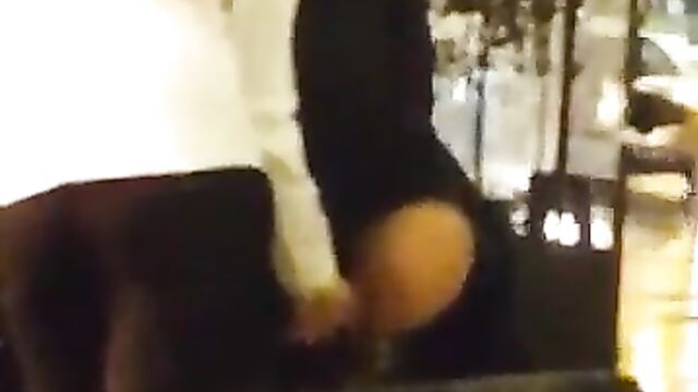 Guy fingering his girlfriend in a public restaurant - 1 image