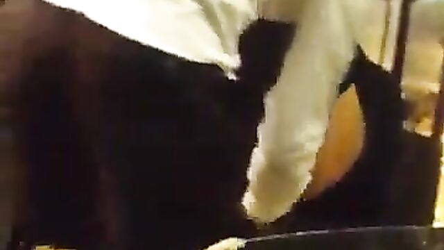 Guy fingering his girlfriend in a public restaurant