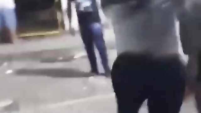 Dog exposes girl’s ass in public as she fights her boyfriend’s side chick on the street - 3 image