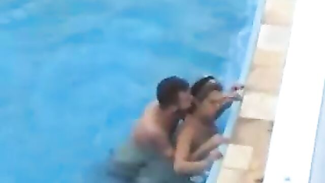 Discreet Sex In The Pool In Public