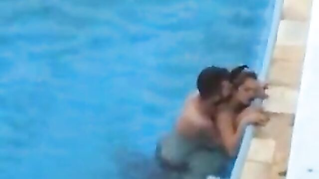 Discreet Sex In The Pool In Public - 5 image