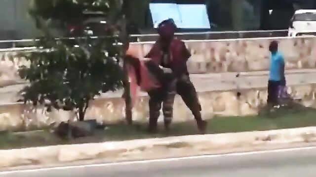 Mad Couple Caught Having Sex Doggy Style On Road Divider In Broad Daylight! - 1 image