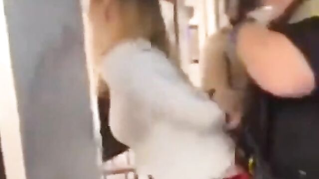 Woman grinding her ass on police officer’s dick in public during arrest - 1 image