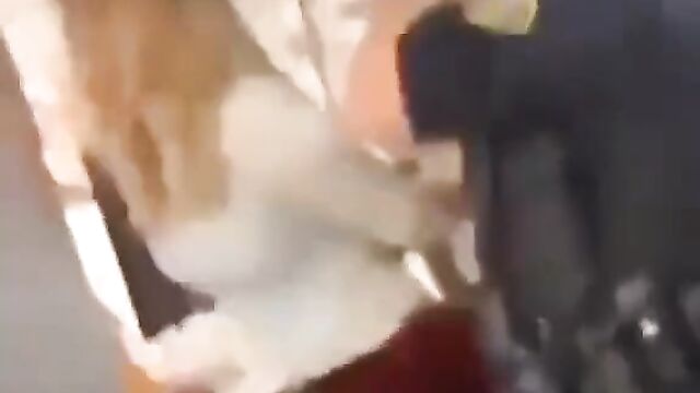 Woman grinding her ass on police officer’s dick in public during arrest