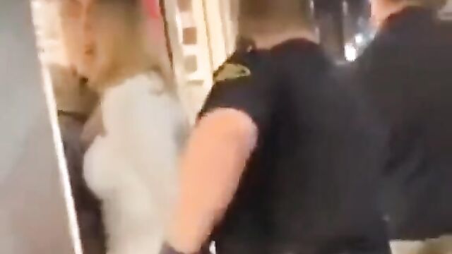 Woman grinding her ass on police officer’s dick in public during arrest - 3 image