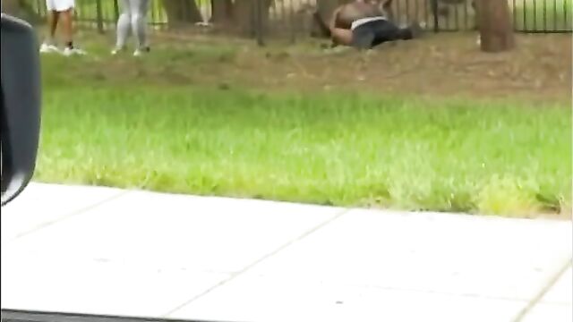 Horny black couple caught having sex in public in broad daylight - 1 image