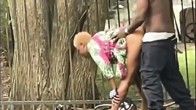 Horny black couple caught having sex in public in broad daylight - 5 image