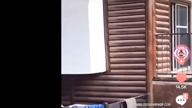 Side chick climbs down balcony in her panties in public to escape from angry wife who caught her with her cheating husband! - 5 image