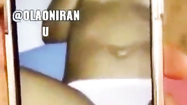 Student films big boobs and pussy of olosho girl with his phone - 1 image