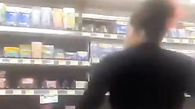 Chick flashing her big ass in a store in public - 3 image