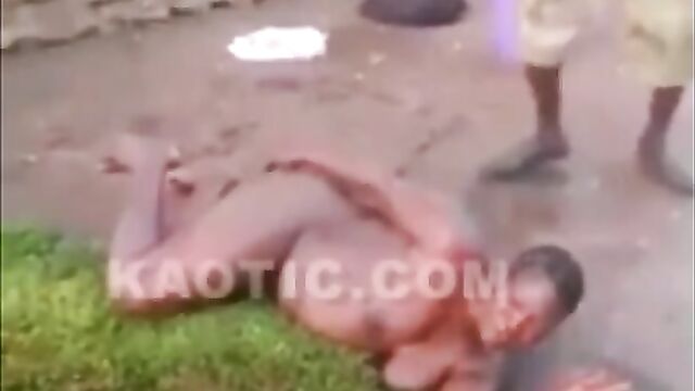 African man caught flogging naked & pregnant wife! - 2 image