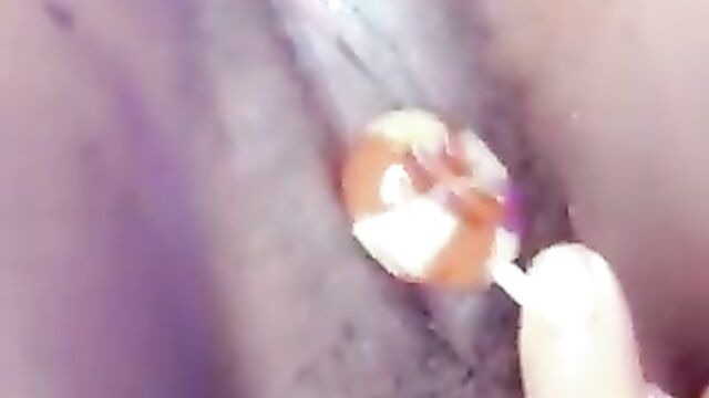 Girl caught doing it with lollipop - 1 image