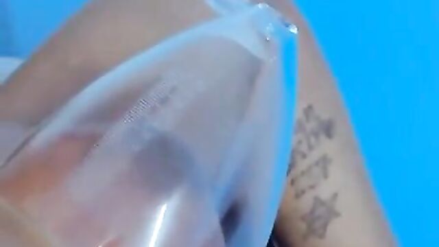 African girl caught pumping her breasts - 5 image