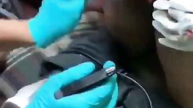 Chick Getting An Anal Tattoo - 5 image