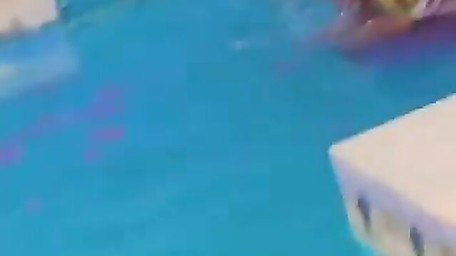 Naked African couple having sex in a pool in public - 5 image