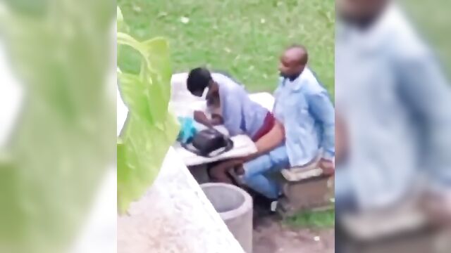 African couple caught having discreet sex in a public park