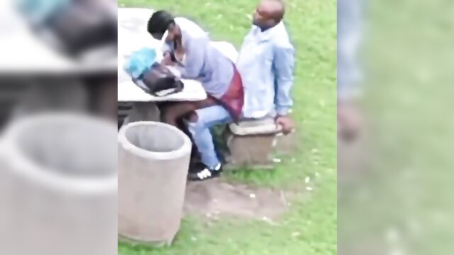 African couple caught having discreet sex in a public park - 5 image