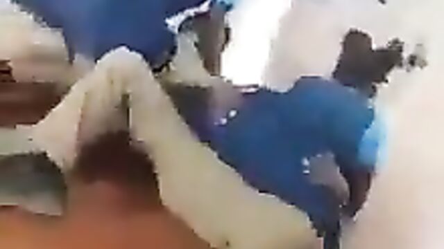 School girls caught doing it with panties exposed inside school hall - 1 image