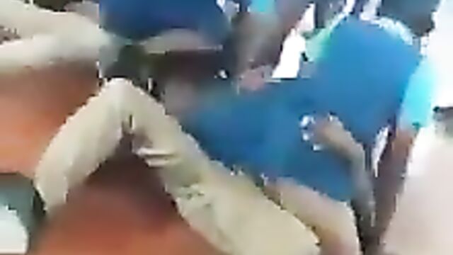 School girls caught doing it with panties exposed inside school hall - 4 image