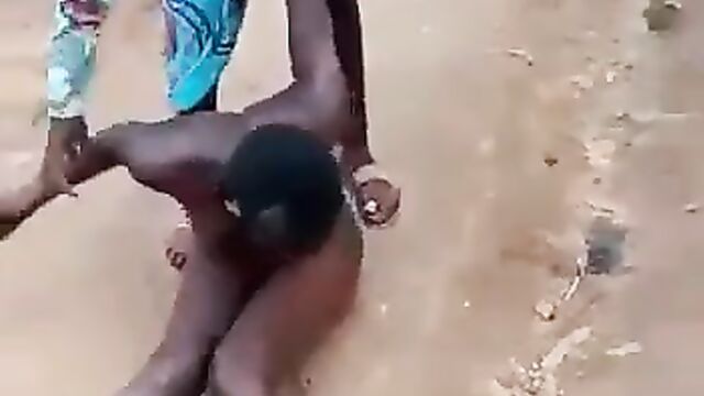 Woman strips daughter naked in public for allegedly having a boyfriend! - 1 image