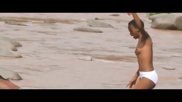 Mzansi girls showing their breasts in a village river