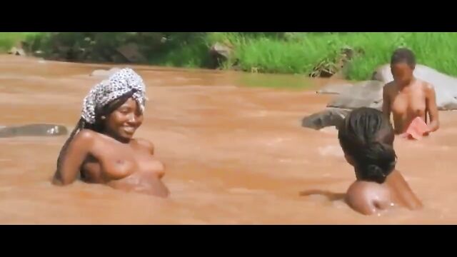 Mzansi girls showing their breasts in a village river - 5 image