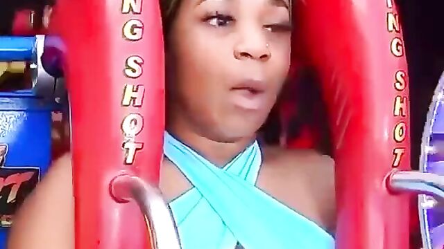 Boobs Exposed In Public As Girl Takes Slingshot Ride - 1 image