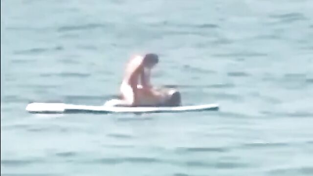 Naked couple caught having sex on a raft in public - 3 image