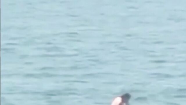 Naked couple caught having sex on a raft in public - 5 image