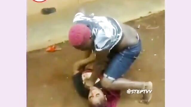 Big Breasts Out As 2 African Prostitutes Fight In Public - 1 image