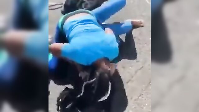 Boobs out as black whore beats up white girl in public