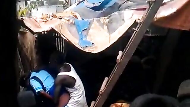 School girl bonking a dude in a shack - 1 image