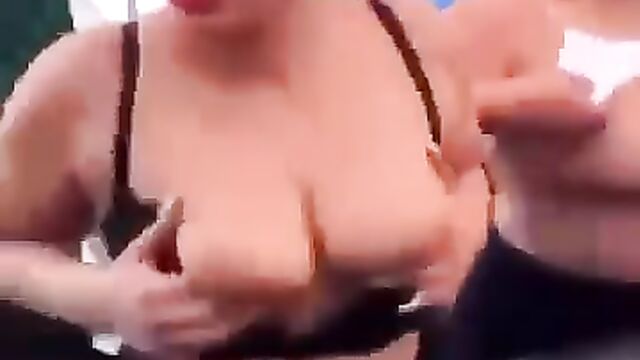 Girls go wild, showing breasts in public - 1 image