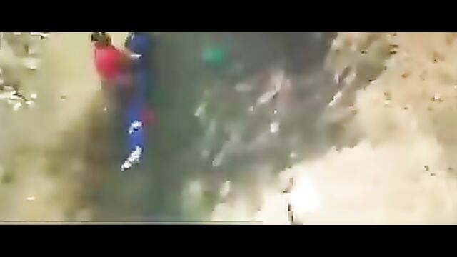 Couple caught having sex on grass