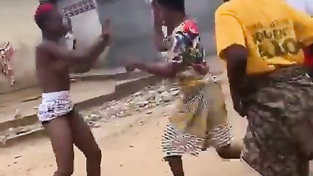 2 African ladies fighting, showing breasts - 3 image
