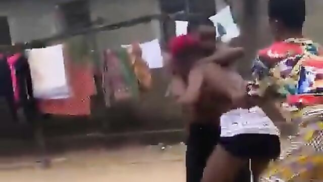 2 African ladies fighting, showing breasts - 5 image