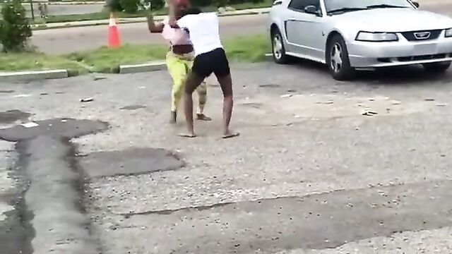 Big breasts fly out in brutal public girl fight - 1 image