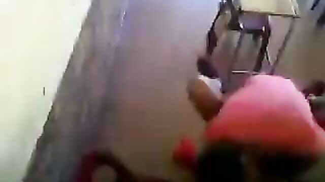 2 students bonking on a desk