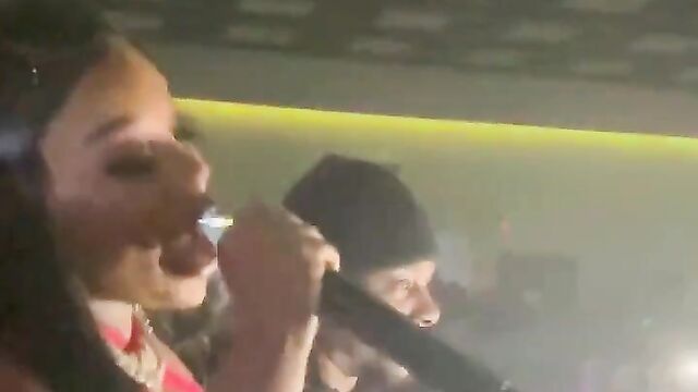 Suki rapping with her breasts out in public - 4 image