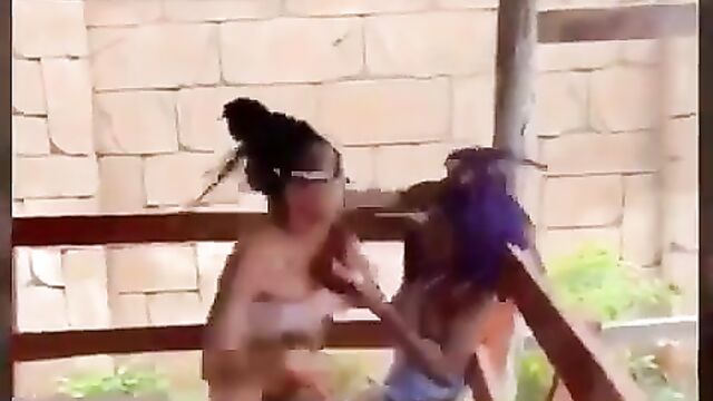 Boobs and ass exposed as 2 prostitutes fight in public in Lagos - 1 image