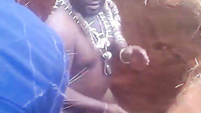 Naked native doctor performing rituals inside a grave - 4 image