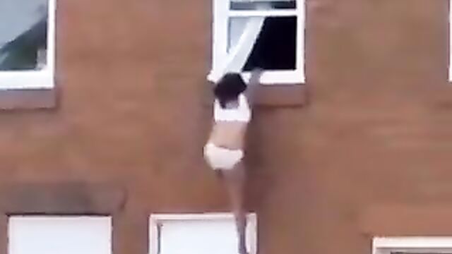 Side chick jumps off apartment window after angry wife caught her with her cheating husband - 3 image